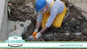 Technician Performing Sewer Repair