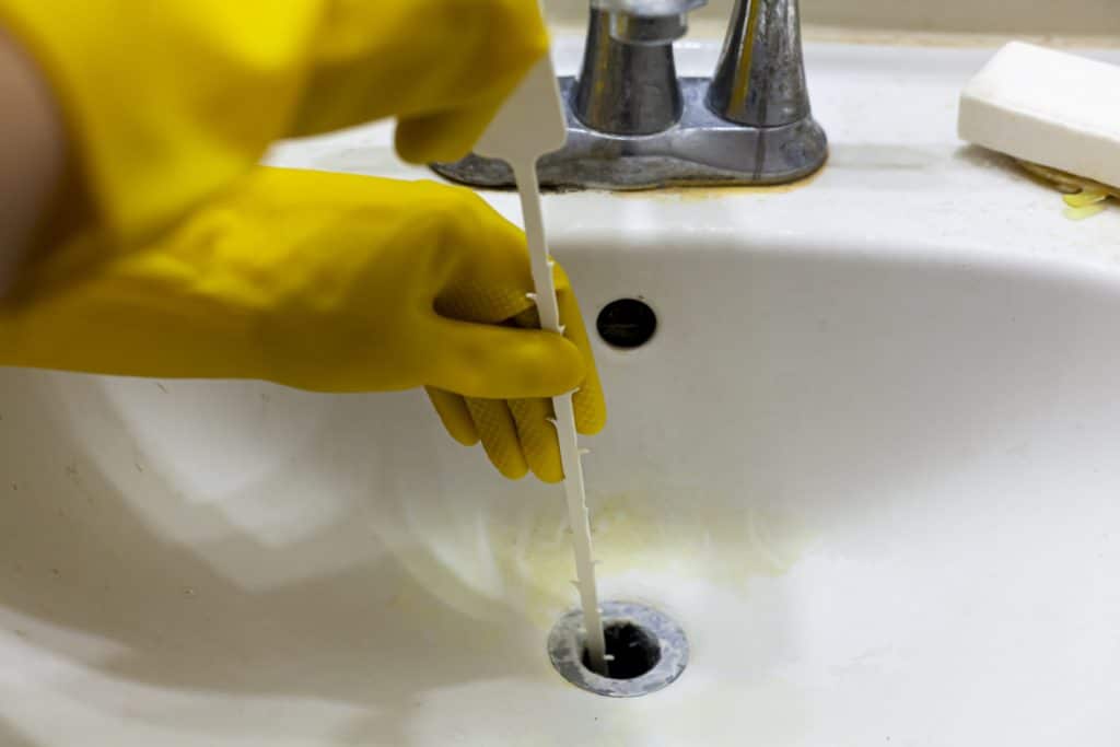 unclog the drain of a sink